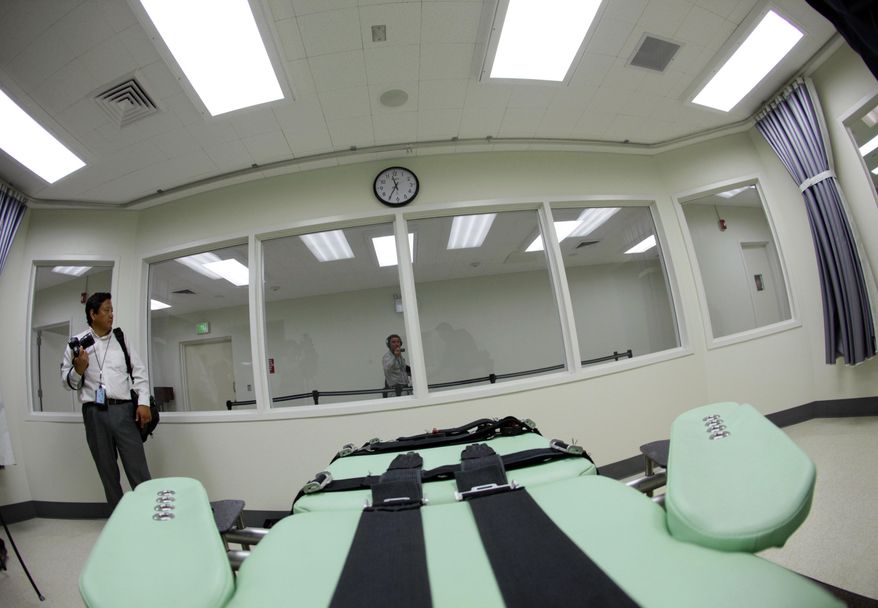 FILE - In this Sept. 21, 2010 file photo, the view a condemned inmate would have from a table inside the death chamber is shown during a tour of the new lethal injection facility at San Quentin State Prison in San Quentin, Calif. Death penalty supporters are setting the stage for a November showdown over whether to speed up executions in California or do away with them entirely. They'll be holding some 10 news conferences up and down the state on Thursday, May 19, 2016. (AP Photo/Eric Risberg, File)