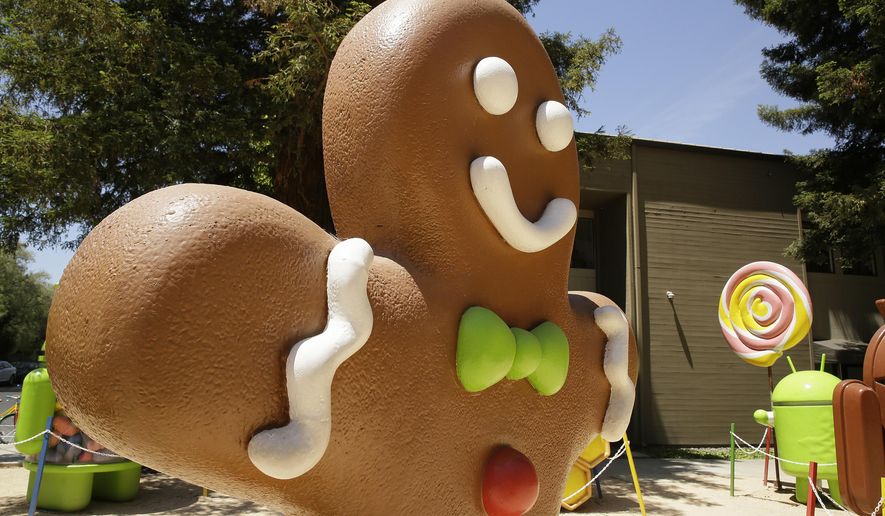 This Wednesday, May 18, 2016, photo shows a sculpture at Google's Mountain View, Calif., campus depicting a version of Android called Gingerbread. It's one of the older versions of Android, released in 2010. Newer versions are available, but many phones still don't have them because many phone makers and wireless carriers don't bother making necessary tweaks for older phones. (AP Photo/Eric Risberg)