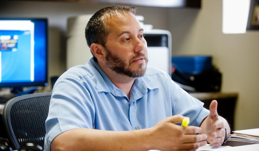 ADVANCE FOR USE MONDAY, MAY 23 - In this photo taken Thursday May 12, 2016, Michael Benefield speaks in Longview, Texas, about representing inmate Rasheed Ali in a religious freedom case allowing Ali to grow a four inch beard and wear a kufi. (Michael Cavazos/The News-Journal via AP) MANDATORY CREDIT