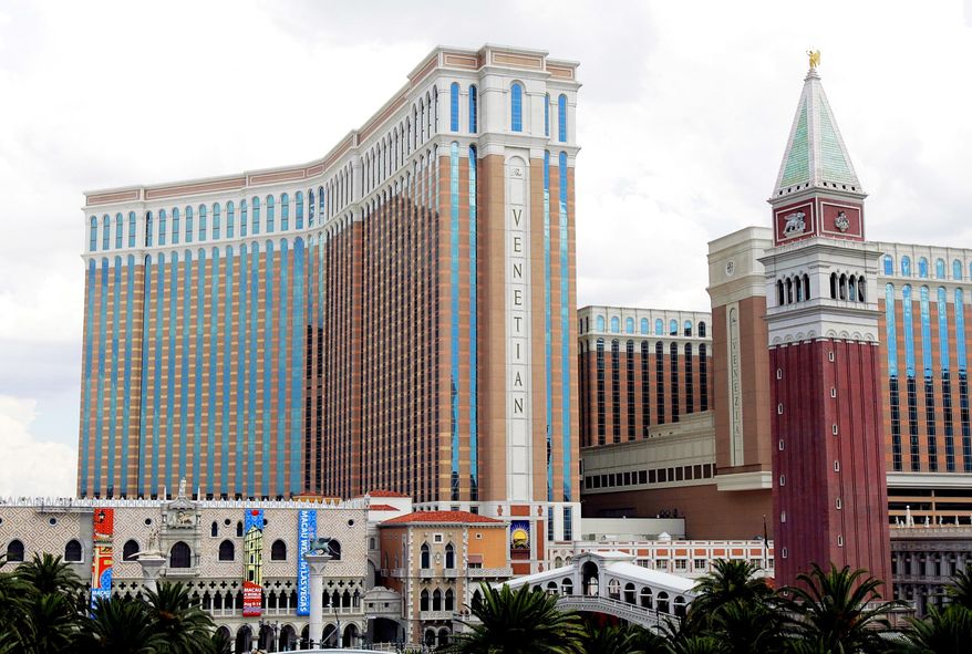 FILE - This Aug. 2, 2005 file photo shows the Venetian Hotel and Casino on the Las Vegas Strip. Nevada state regulators are expected to approve Thursday, May 19, 2016, a $2 million fine against Las Vegas Sands Corp., owner of the Venetian and other properties, to settle a complaint that the casino company didn't properly account for millions of dollars paid to a Chinese consultant and received from a high roller.(AP Photo/Joe Cavaretta, File)