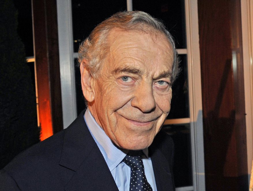 This Oct. 6, 2008 photo released by CBS shows "60 Minutes" correspondent Morley Safer during the program's 40th anniversary celebration in New York. Safer, the veteran “60 Minutes” correspondent who exposed a military atrocity in Vietnam that played an early role in changing Americans’ view of the war, died Thursday, May 19, 2016. He was 84. (John Paul Filo/CBS via AP)