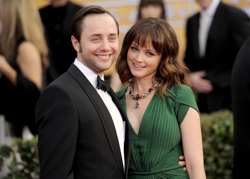 FILE - In this Jan. 27, 2013, file photo, actors Vincent Kartheiser, left, and Alexis Bledel pose at the 19th Annual Screen Actors Guild Awards at the Shrine Auditorium in Los Angeles. Representatives for both actors confirmed on May 19, 2016, that the couple welcomed a baby boy in the fall of 2015. (Photo by Chris Pizzello/Invision/AP, File)