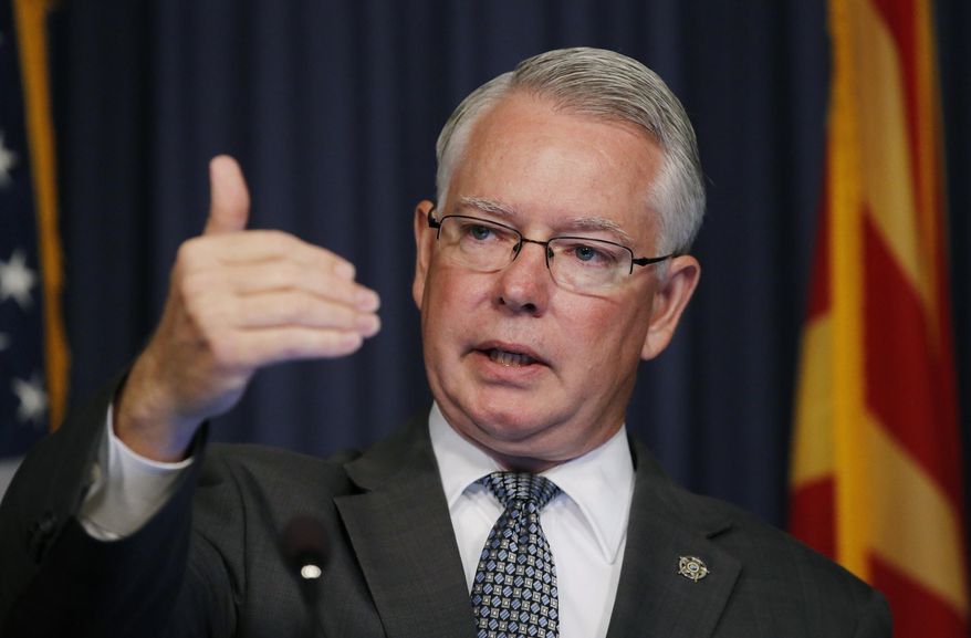 Maricopa County Attorney Bill Montgomery announces a Mesa police officer will not face criminal charges in the fatal shooting of Ivan Krstic during a confrontation last December during a news conference Thursday, May 19, 2016, in Phoenix. Police in December said an officer fatally shot Krstic as the man wielded a 3-foot-long steel rod during a confrontation in the man's neighborhood. (AP Photo/Ross D. Franklin)