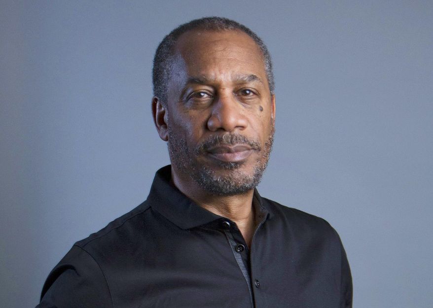 FILE - In this June 15, 2015 file photo, Emmy Award-winning actor Joe Morton poses for a portrait in New York. Morton is starring in the off-Broadway one-man-show “Turn Me Loose” at the Westside Theatre in New York. The play is about Dick Gregory, who broke barriers as a black comedian and used his comedy to spread messages about social justice and better health. (Photo by Amy Sussman/Invision/AP, File)
