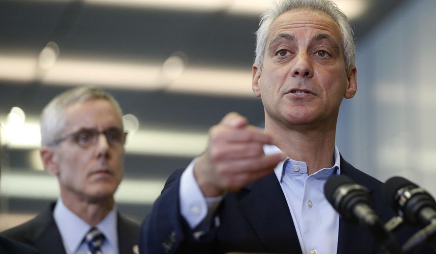 Chicago Mayor Rahm Emanuel, right, responds to a question related to the massive delays at airport security lines across the country, as Transportation Security Administration chief Peter Neffenger listens Friday, May 20, 2016, in Chicago. (AP Photo/Charles Rex Arbogast)
