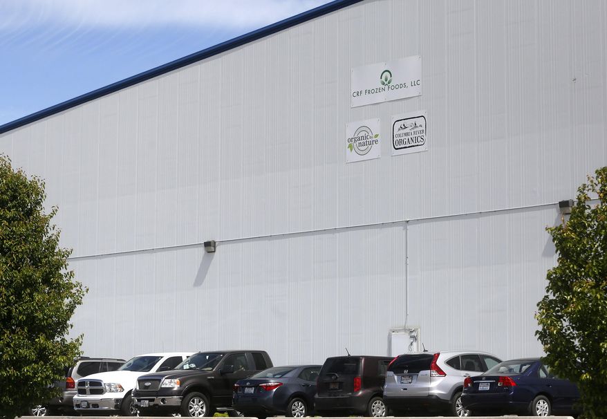 This May 11, 2016, photo, shows the outside of CRF Frozen Foods, LLC, in Pasco, Wash. The company shut down its processing operations over a listeria breakout that has sickened customers in several states. (Sarah Gordon/The Tri-City Herald via AP) LOCAL TELEVISION OUT; LOCAL RADIO OUT KONA