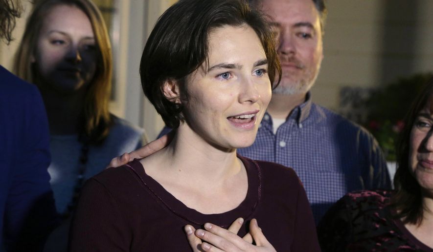 FILE - In this Friday, March 27, 2015 file photo, Amanda Knox talks to members of the media outside her mother's home in Seattle. The European Court of Human Rights has agreed to hear Amanda Knox's case challenging her slander conviction during the trial for her British roommate's 2007 murder, her Italian defense lawyer said Friday, May 20, 2016. Dalla Vedova said the Strasbourg court's decision this week is "good news" for his client, because the vast majority of cases are rejected at the preliminary stage. The Italian government has until September to provide its response. (AP Photo/Ted S. Warren, file)