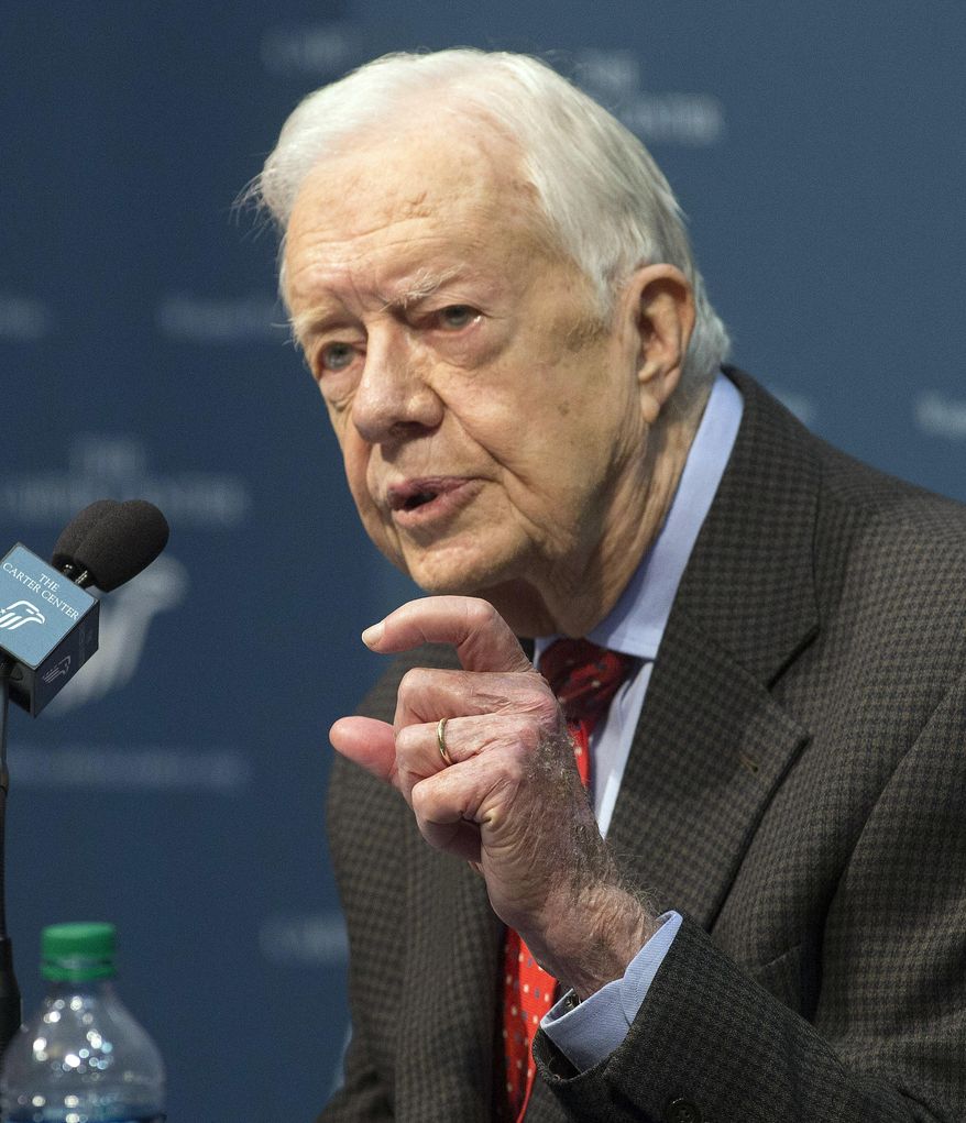 File-This Aug. 20, 2015, file photo shows former President Jimmy Carter talking about his cancer diagnosis during a news conference at The Carter Center in Atlanta. Carter bemoans the influence of big donors in elections and “polarized” political parties. But the former president says he remains hopeful and especially encouraged college-age people will stay engaged by voting, protesting and otherwise speaking out. A wide-ranging interview with Carter on Friday, May 20, 2016, opened a new National Archives event series highlighting immigration, civil and women’s rights and educational access. (AP Photo/Phil Skinner, File)