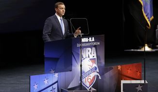 National Rifle Association executive director Chris W. Cox speaks at the National Rifle Association convention Saturday, May 21, 2016, in Louisville, Ky. (AP Photo/Mark Humphrey)