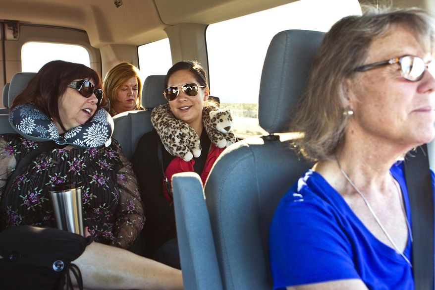 In this May 3, 2016 photo, a group of Las Vegas teachers depart every morning at 6 a.m. in a large van and drive to Baker, Calif. to work at the school. (L.E. Baskow/Las Vegas Sun via AP) LAS VEGAS REVIEW-JOURNAL OUT; MANDATORY CREDIT