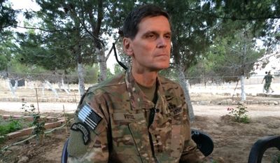 Army Gen. Joseph Votel speaks to reporters Saturday, May 21, 2016, during a secret trip to Syria. Votel said he is encouraged by progress in building local Syrian Arab and Kurdish forces to fight the Islamic State. (AP Photo/Robert Burns)