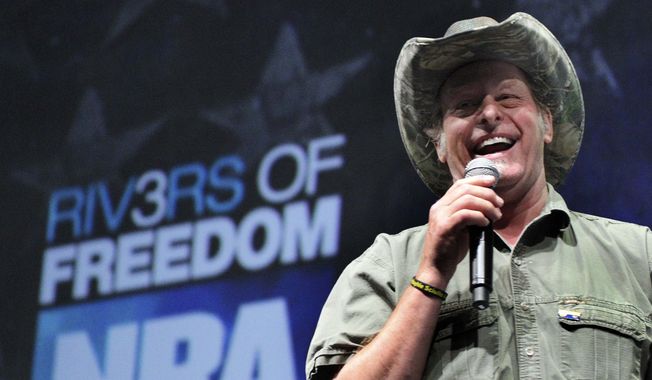 In this May 1, 2011, file photo, musician and gun rights activist Ted Nugent addresses a seminar at the National Rifle Association&#x27;s 140th convention in Pittsburgh. (AP Photo/Gene J. Puskar) ** FILE **