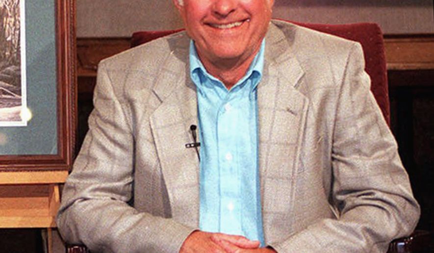 FILE - In this June 8, 1999, file photo, outdoors artist Terry Redlin is seen at his gallery in Watertown, S.D. Redlin is remembered not only for his art but also for his love of the outdoors and his contributions to conservation. Redlin died in late April after a lengthy battle with Alzheimer's disease. He was 78. (Val Hoeppner/The Argus Leader via AP, File) NO SALES; MANDATORY CREDIT