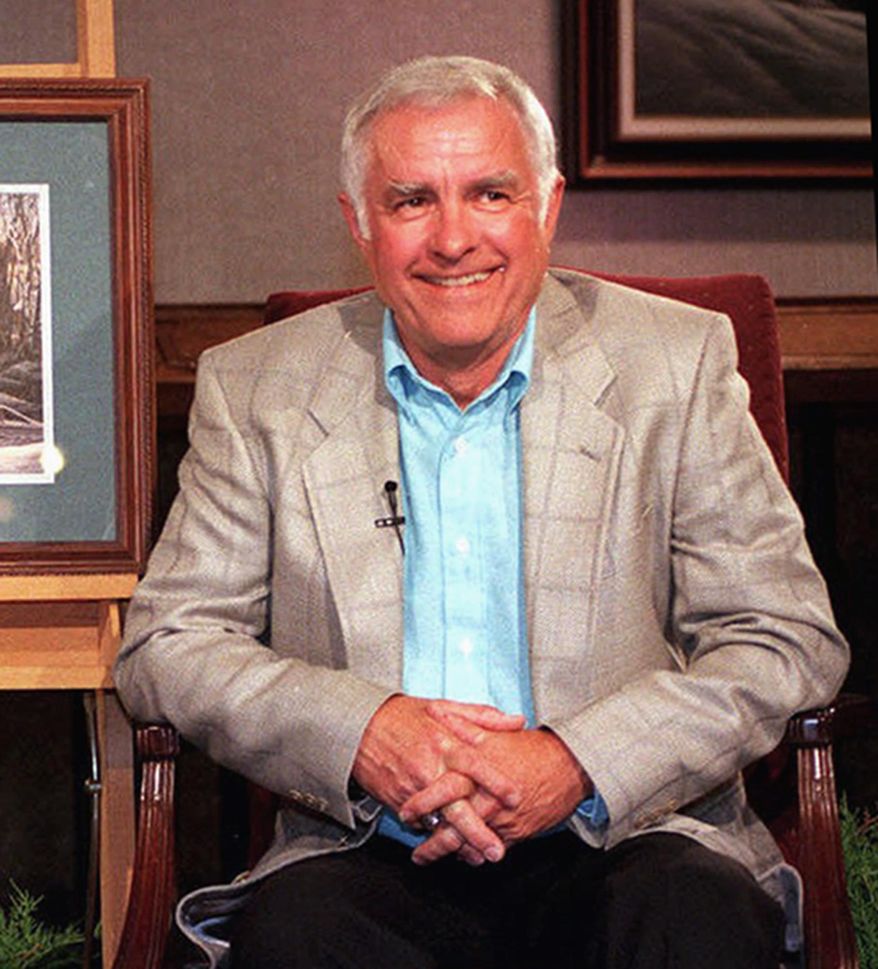 FILE - In this June 8, 1999, file photo, outdoors artist Terry Redlin is seen at his gallery in Watertown, S.D. Redlin is remembered not only for his art but also for his love of the outdoors and his contributions to conservation. Redlin died in late April after a lengthy battle with Alzheimer's disease. He was 78. (Val Hoeppner/The Argus Leader via AP, File) NO SALES; MANDATORY CREDIT