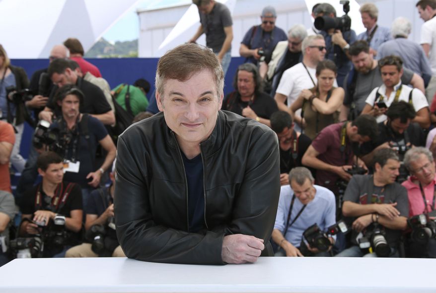 FILE - In this Sunday, May 15, 2016, file photo, filmmaker Shane Black poses for photographers during a photo call for the film "The Nice Guys" at the 69th international film festival in Cannes, France. The 54-year-old writer-director, who wrote the 1987 movie "Lethal Weapon," spent his childhood in western Pennsylvania, soaking up antihero pulp fiction from comics he found in outlets around Pittsburgh and novels his father read in their Mount Lebanon, Pa., home. (AP Photo/Joel Ryan, File)