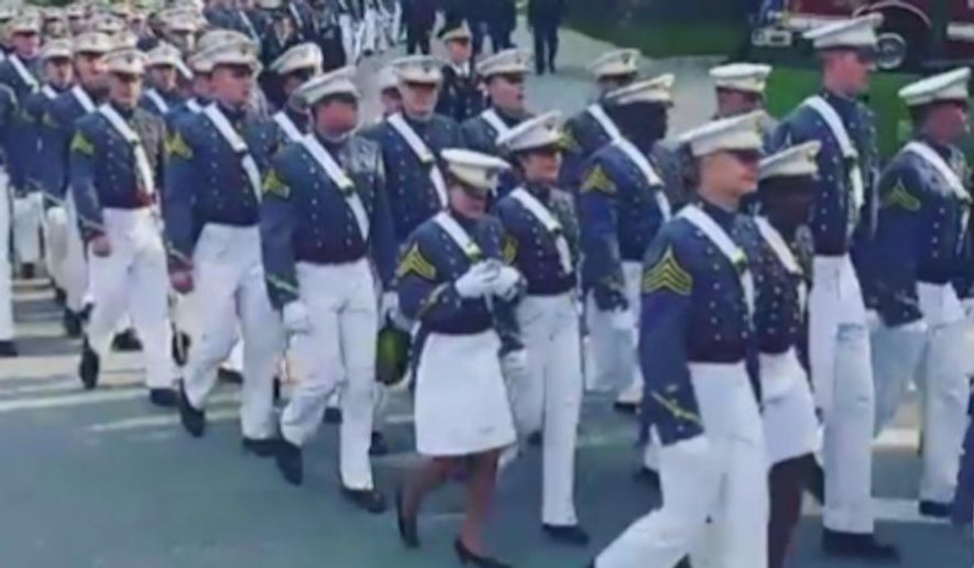 A video showing a West Point cadet apparently using her cellphone Saturday during a march to the prestigious military academy&#39;s graduation ceremony has sparked backlash. (Facebook/@West Point)