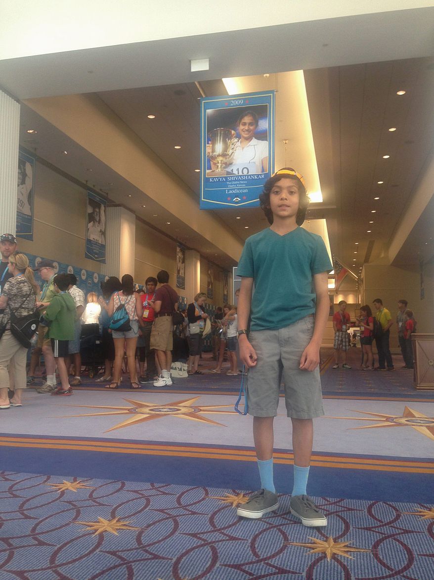 Amrith Samuel, 12, is representing Olathe, Kansas — the hometown of last year's spelling bee co-champion, Vanya Shivashankar. Amrith is competing against 273 others in this year's Scripps Howard National Spelling Bee. (Faith E. Pinho / The Washington Times)