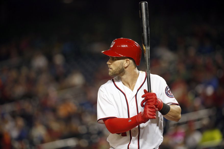 Washington Nationals right fielder Bryce Harper (34) bats during a baseball game against the New York Mets at Nationals Park, Monday, May 23, 2016, in Washington. The Mets won 7-1. (AP Photo/Alex Brandon)