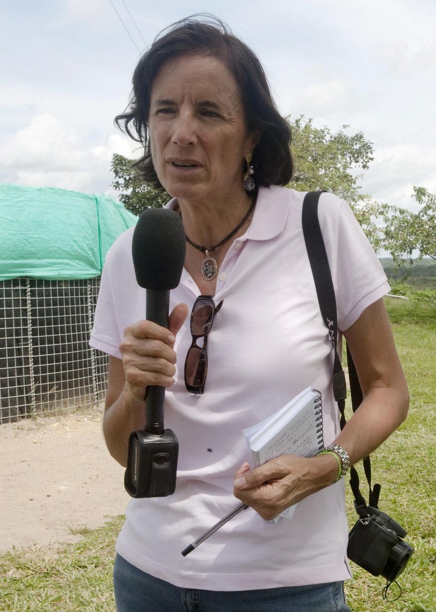 This undated photo, courtesy of El Tiempo newspaper, shows Salud Hernandez-Mora, correspondent in Colombia for Spain's El Mundo and columnist for the Bogota daily El Tiempo, working in an unknown location in Colombia. Security forces are searching for Hernandez-Mora, who was last seen on Saturday, May 21, 2016 in El Tarra, on the northeastern Colombia's border with Venezuela, a mountainous area dominated by leftist rebels and drug-traffickers. (El Tiempo via AP)