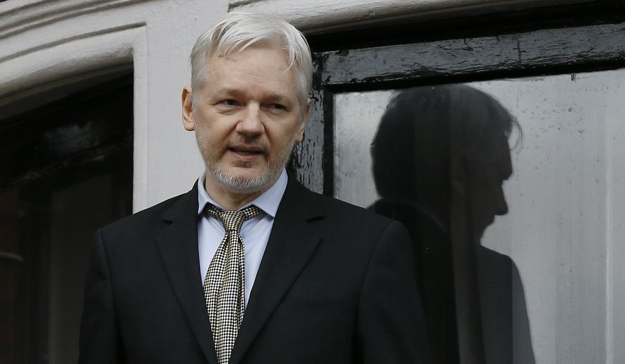 In this Friday Feb. 5, 2016 file photo, Wikileaks founder Julian Assange speaks from the balcony of the Ecuadorean Embassy in London. (AP Photo/Kirsty Wigglesworth, File)