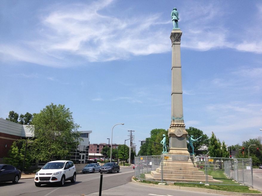 In this Tuesday, May 24, 2016 photo, a stone monument to Confederate soldiers killed in the Civil War sits near the University of Louisville in Louisville, Ky. A judge has ended a restraining order that barred the city of Louisville from removing the 120-year-old monument to Confederate soldiers. (AP Photo/Dylan Lovan)