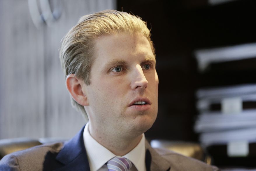 In this photo taken May 12, 2016, Eric Trump, son of Republican presidential candidate Donald Trump, responds to questions during an interview in New York. The windows of Eric Trump’s office in the Trump Tower offer breathtaking views of some of Manhattan’s most expensive real estate. It’s there the youngest of Donald Trump’s adult sons is reflecting on eye-opening moments from a world far away. (AP Photo/Frank Franklin II)