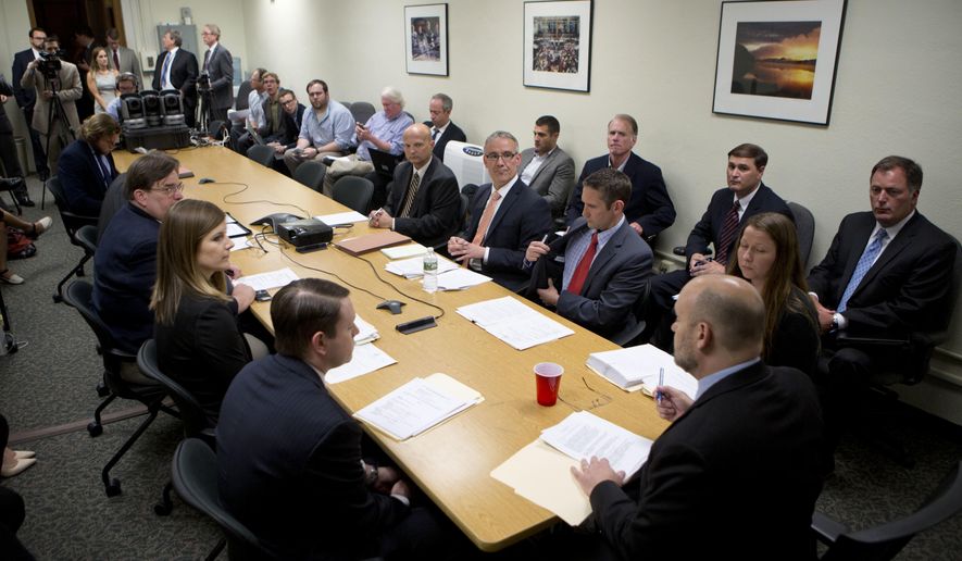 The Public Authorities Control Board meets at the state Capitol, Wednesday, May 25, 2016, in Albany, N.Y. The board controlled by the Legislature and Democratic Gov. Andrew Cuomo authorized spending $485 million to complete a solar panel production plant, the centerpiece of Cuomo's "Buffalo Billion" economic development program. (AP Photo/Mike Groll)