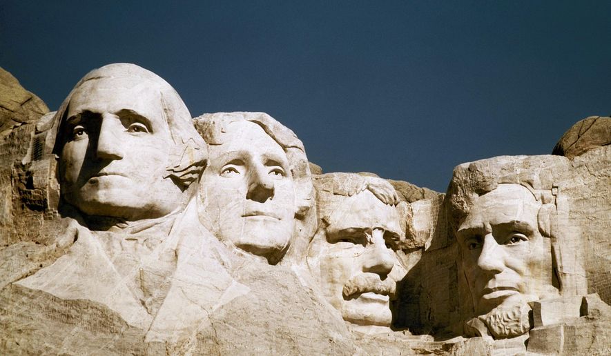 FILE - In this undated file photo, Mount Rushmore is shown in South Dakota. From left are George Washington, Thomas Jefferson, Teddy Roosevelt and Abraham Lincoln. The Partners in Preservation Campaign is asking the public to vote on 20 historic sites, including one at Mount Rushmore, that are vying for $2 million in preservation funding. The project at Mount Rushmore seeks $250,000 to restore structural elements of the Borglum View Terrace, where Rushmore sculptor Gutzon Borglum's original studio stood. (AP Photo, File)