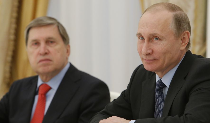 Russian President Vladimir Putin, right, and his foreign affairs adviser Yury Ushakov listen to Serbian Prime Minister and Progressive Party leader Aleksandar Vucic during their talks in Moscow, Russia, Thursday, May 26, 2016. (Sergei Karpukhin/Pool Photo via AP)