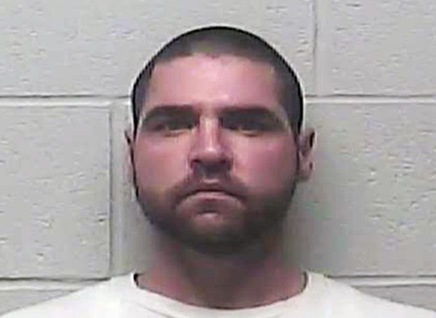 This undated photo provided by the Burleigh County Sheriff's Department in Bismarck, N.D., shows Tyler Porter, of Williston, N.D. Porter, who is accused of stealing explosives from companies operating in the western North Dakota oil patch and stashing them in his home, also allegedly had books on preparing explosives. He is charged in federal court with possessing explosives and two weapons counts. (Burleigh County Sheriff's Department via AP)