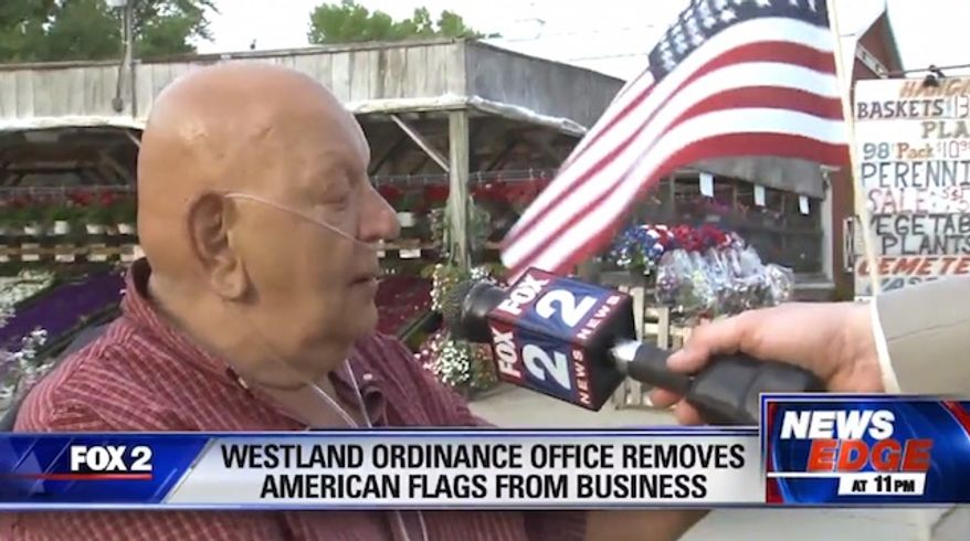 Ken Dabelstein of Westland, Mich, had his American flags confiscated from outside his business by a city worker right before Memorial Day weekend. (FJBK-2 Fox News Michigan screenshot)