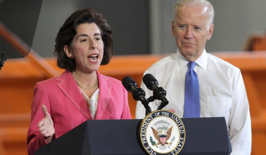 Vice President Joe Biden listens to Rhode Island Gov. Gina Raimondo speak during a visit to a RI DOT facility and bridge under repair in East Providence, R.I., Friday, May 27, 2016. (Steve Szydlowski /Providence Journal via AP) NO SALES; MANDATORY CREDIT