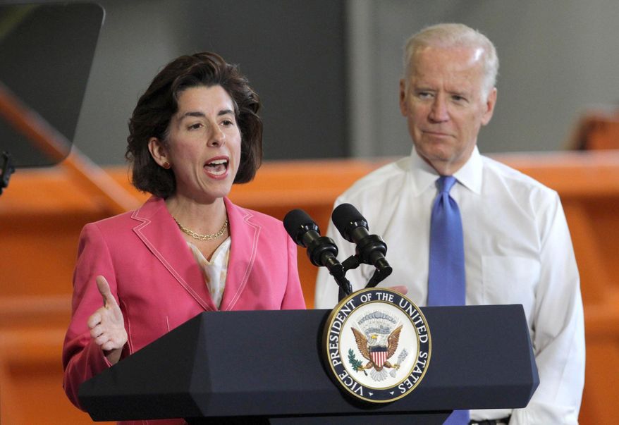 Vice President Joe Biden listens to Rhode Island Gov. Gina Raimondo speak during a visit to a RI DOT facility and bridge under repair in East Providence, R.I., Friday, May 27, 2016. (Steve Szydlowski /Providence Journal via AP) NO SALES; MANDATORY CREDIT