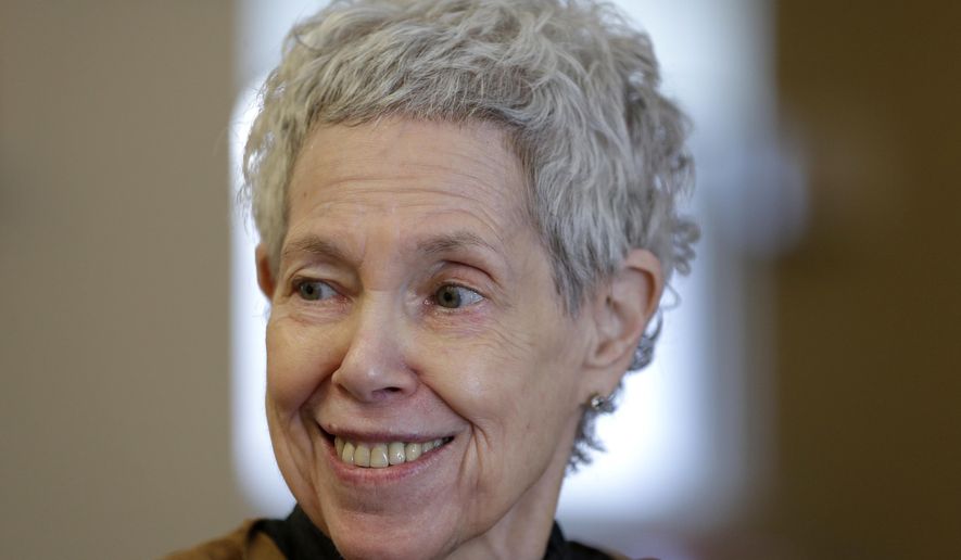 In this March 19, 2016 photo, Barbara Handschu talks to a reporters at her apartment in New York. Handschu barely gave it a thought 45 years ago when she was listed first among plaintiffs in a Vietnam-era lawsuit challenging how New York City police officers conducted surveillance of political activities. (AP Photo/Seth Wenig)