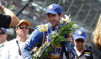 Alexander Rossi, a 24-year-old American, smiles after he won the 100th Indianapolis 500 on Sunday as a 66-to-1 long shot. (Associated Press)