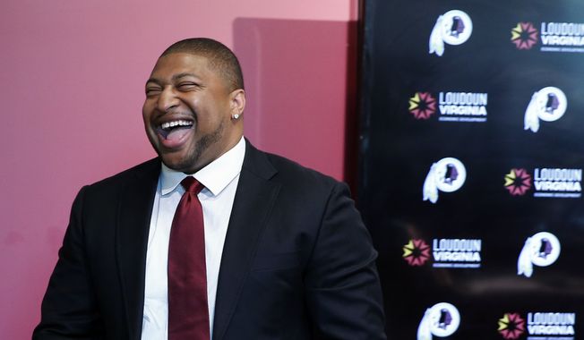 Former Washington Redskins defensive end Stephen Bowen smiles after speaking during a media availability at the team&#x27;s NFL football training facility at Redskins Park, Wednesday, June 1, 2016 in Ashburn, Va. The Redskins announced Bowen had retired from the NFL earlier Wednesday, after 10 years in the league. (AP Photo/Alex Brandon)
