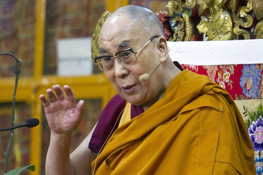 Tibetan spiritual leader the Dalai Lama gives a religious talk at the Tsuglakhang temple in Dharmsala, India, Wednesday, June 1, 2016. The Tibetan leader started a three-day religious discourse for young Tibetans on Wednesday. (AP Photo/Ashwini Bhatia)
