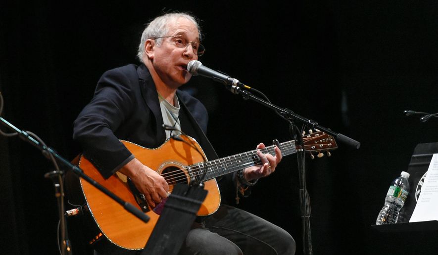 In this Oct. 6, 2015, file photo, Paul Simon participates in the Country Music Hall of Fame benefit concert in New York. Simon&#39;s latest album, &amp;quot;Stranger to Stranger,&amp;quot; will be released Friday, June 3. (Photo by Evan Agostini/Invision/AP, File)