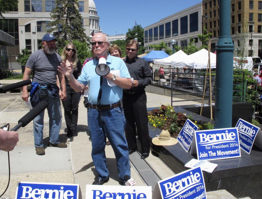Bernie Sanders backer Buzz Davis speaks in support of a nonbinding resolution that would take away the freedom of Democratic Party super delegates to vote for whichever presidential candidate they choose on Wednesday, June 1, 2016, in Madison, Wis. (AP Photo/Scott Bauer)