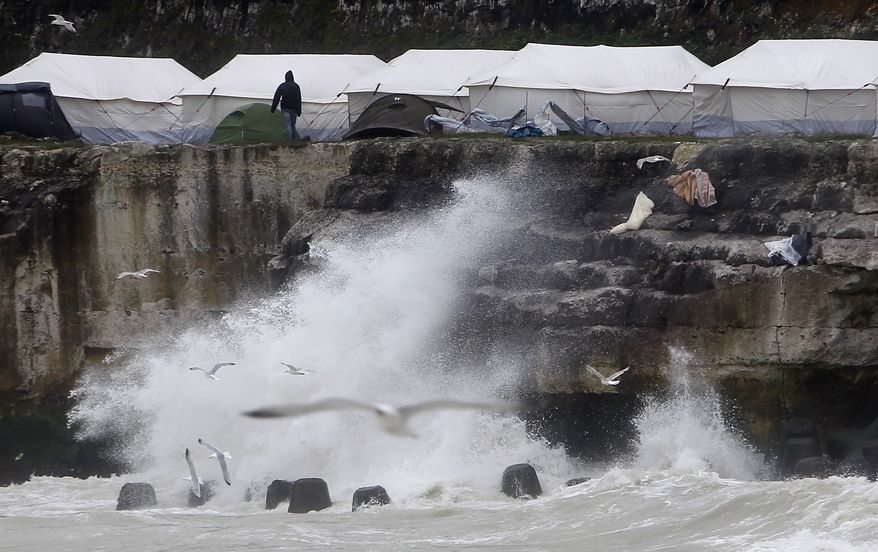 Migrant and refugee tents are set up in a new makeshift camp along the cliffs at the port of Dieppe, northern France, Thursday, June 2, 2016. A group of around 150 Albanian's have set up camp near the English channel hoping to cross to the UK. (AP Photo/Michel Spingler)