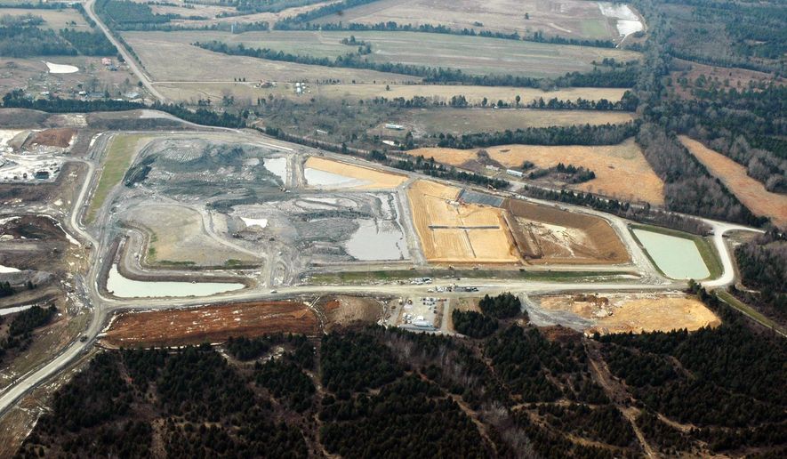 This file photograph taken Feb. 10, 2010, shows the massive Arrowhead Landfill near Uniontown, Ala. Opponents of the landfill are asking a federal court to dismiss a slander lawsuit filed by the Georgia-based landfill operators, Thursday, June 2, 2016, who contend they have been wrongly maligned by false allegations and protests over the operation. The landfill accepted tons of coal ash spilled during an accident at a Tennessee Valley Authority electricity plant in Tennessee December 2008. (AP Photo/Jay Reeves)