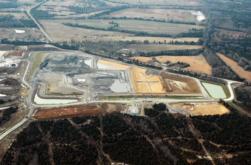 This file photograph taken Feb. 10, 2010, shows the massive Arrowhead Landfill near Uniontown, Ala. Opponents of the landfill are asking a federal court to dismiss a slander lawsuit filed by the Georgia-based landfill operators, Thursday, June 2, 2016, who contend they have been wrongly maligned by false allegations and protests over the operation. The landfill accepted tons of coal ash spilled during an accident at a Tennessee Valley Authority electricity plant in Tennessee December 2008. (AP Photo/Jay Reeves)