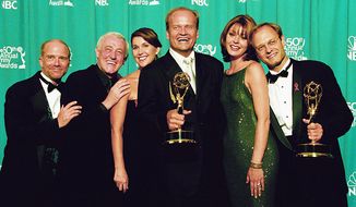 LOS ANGELES, CA - SEPTEMBER 13, 1998: The cast of &quot;Frasier&quot; pose at the Academy of Television Arts &amp; Sciences 50th Annual Primetime Emmy Awards held at the Shrine Auditorium on September 13, 1998 in Los Angeles, California. (Photo by TVA/PictureGroup/Invision for the Academy of Television Arts &amp; Sciences/AP Images)