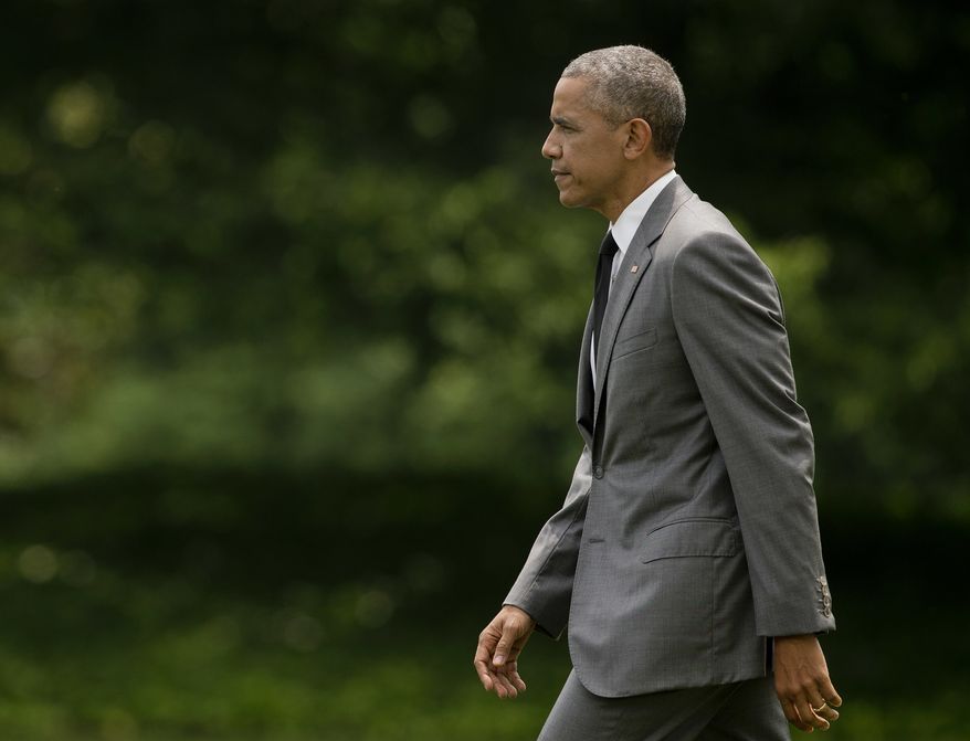 President Barack Obama walks across the South Lawn of the White House in Washington on June 3, 2016, before boarding the Marine One helicopter for the short ride to nearby Andrews Air Force Base, Md. Obama is traveling to Miami for a pair of Democratic fundraisers. (Associated Press)
