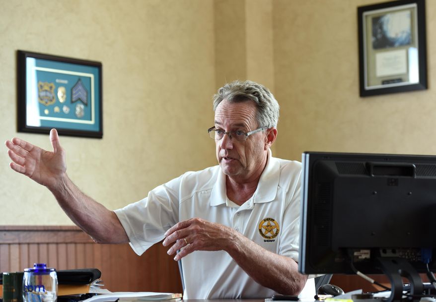 ADVANCE FOR WEEKEND EDITIONS - In this Wednesday, May 25, 2016 photo, Sheriff Mike Milstead talks about crime in Sioux Falls, S.D. Drug-related crime in Sioux Falls is on the rise and increasingly violent, said Milstead, a top local law enforcement official. (Emily Spartz Weerheim/The Argus Leader via AP) MANDATORY CREDIT