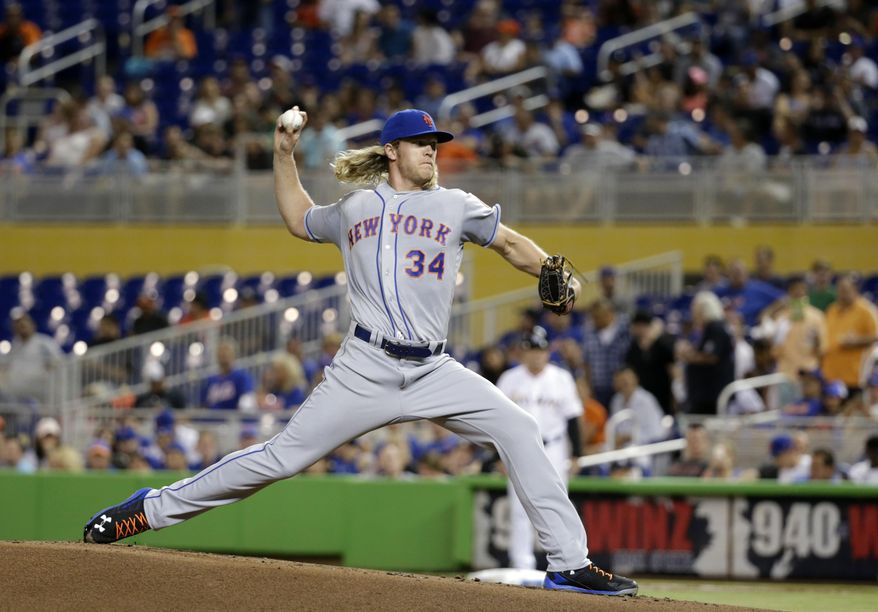 New York Mets' Noah Syndergaard delivers a pitch during the first inning of a baseball game against the Miami Marlins, Friday, June 3, 2016, in Miami. (AP Photo/Wilfredo Lee)