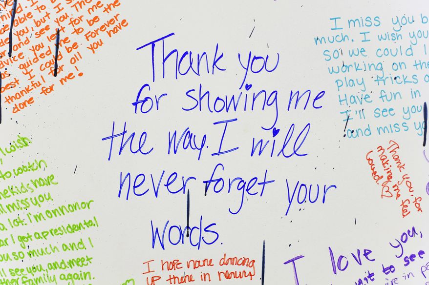 This May 11, 2016 photo shows, messages written by students to loved ones displayed at Lincoln Southwest High School, in Lincoln, Neb. The board was provided by the Mourning Hope Grief Center. (Matt Ryerson /The Journal-Star via AP) LOCAL TELEVISION OUT; KOLN-TV OUT; KGIN-TV OUT; KLKN-TV OUT; MANDATORY CREDIT