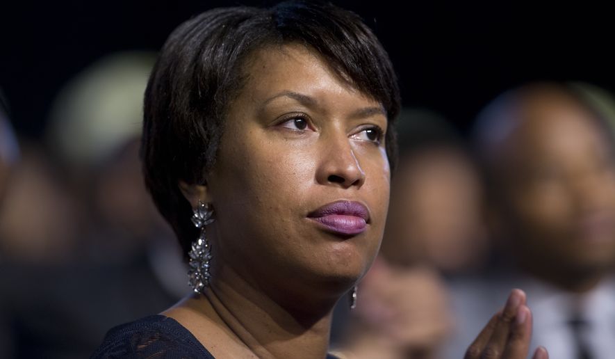 D.C. Mayor Muriel Bowser hired five community outreach officers to try to find at-risk youths so they can get enrolled in a job-training program that provides stipends that could lead to full-time jobs. (Associated Press)