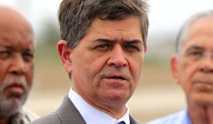 In this June 27, 2014, file photo, Rep. Filemon Vela, D-Texas talks to the media after touring the McAllen Border Patrol station, in McAllen, Texas. (Gabe Hernandez/The Monitor via AP, File)
