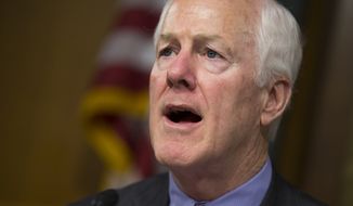 Senate Constitution subcommittee Chairman Sen. John Cornyn, Texas Republican, speaks on Capitol Hill in Washington on June 7, 2016, during a joint subcommittee hearing with the Senate subcommittee on Oversight, Agency Action, Federal Rights and Federal Courts on the Holocaust Expropriated Art Recovery Act. (Associated Press) **FILE**